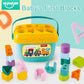 Toddler playing with colorful shape sorter educational toy