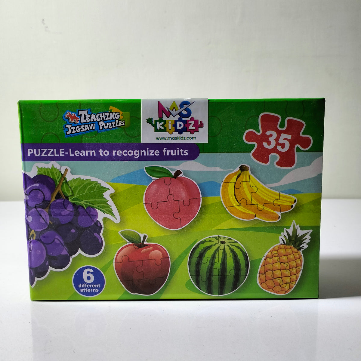 Child assembling a 35 piece fruit jigsaw puzzle educational learning toy